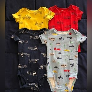 Cater’s Bundle of Four Vehicle Onesies in size 24 months